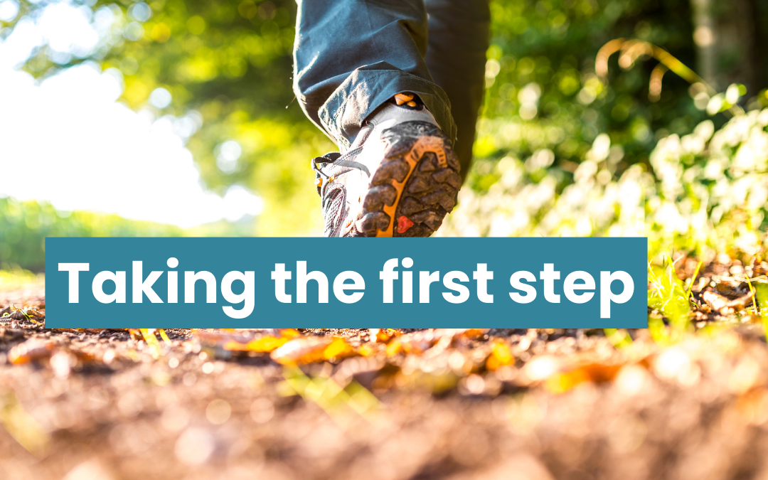 Feet in trainers walking along a leaf strewn path. Text reads taking the first step